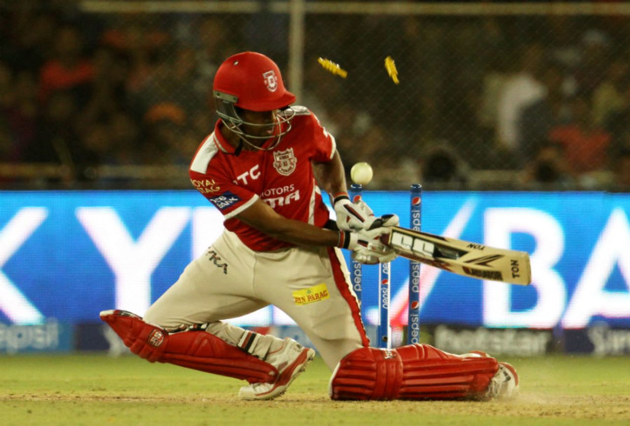 Wriddhiman Saha deflects the ball onto his stumps, Rajasthan Royals v Kings XI Punjab, IPL 2015, Ahmedabad, April 21, 2015