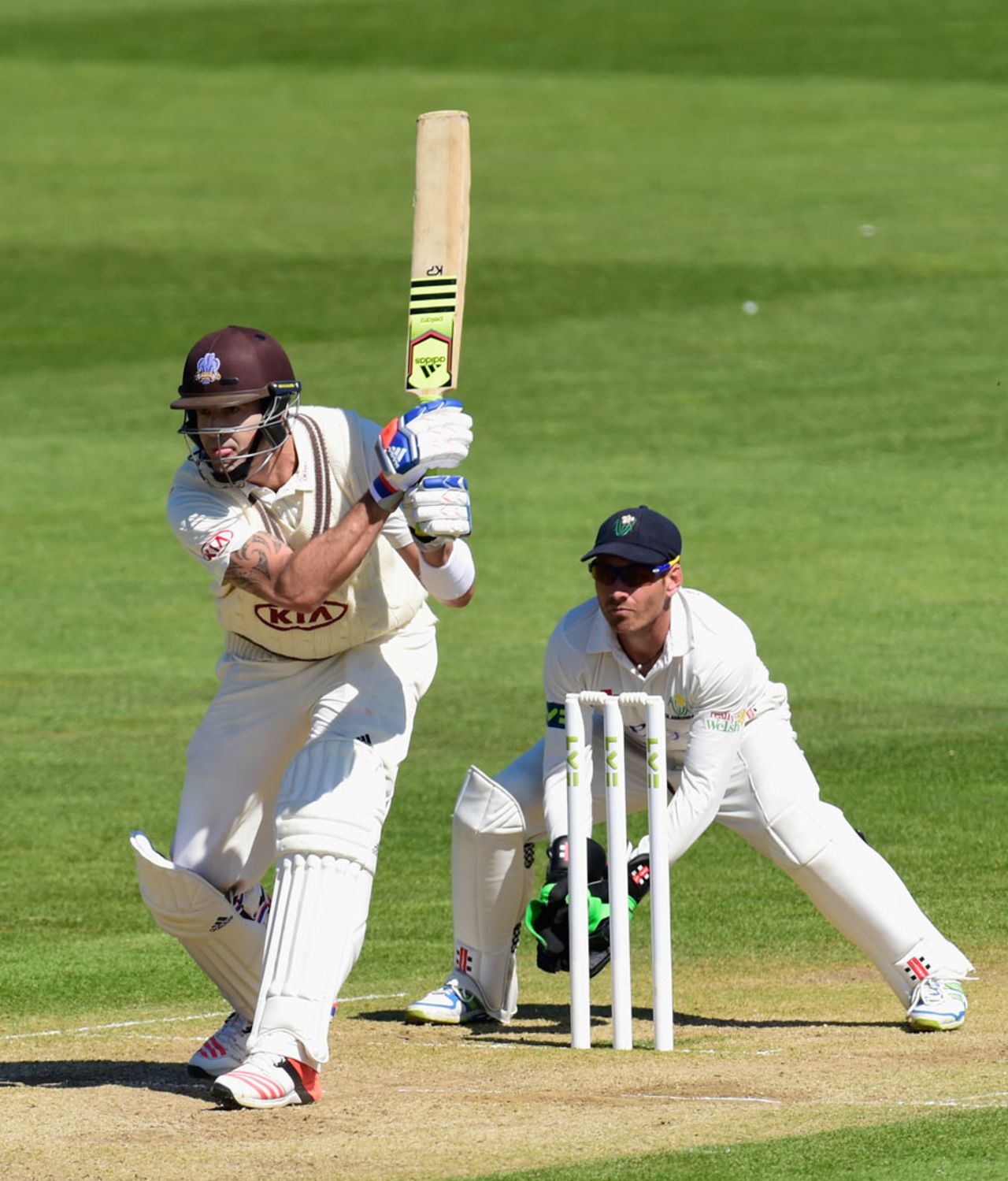 Kevin Pietersen prepares to reverse-sweep, Glamorgan v Surrey, County Championship, Division Two, 4th day, Cardiff, April 22, 2015