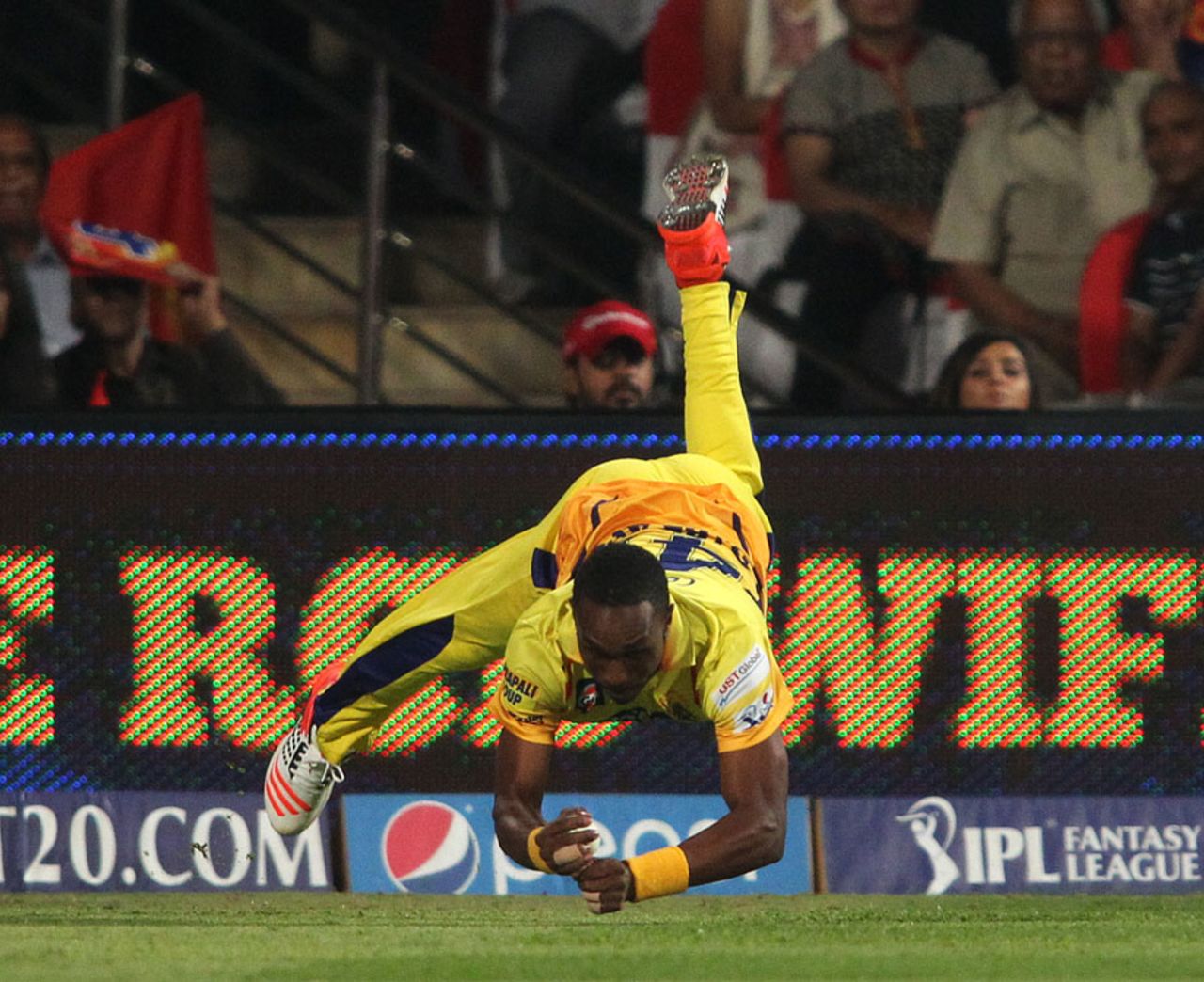 Dwayne Bravo rivaled Faf du Plessis with a stunning catch of his own, Royal Challengers Bangalore v Chennai Super Kings, IPL 2015, Bangalore, April 22, 2015