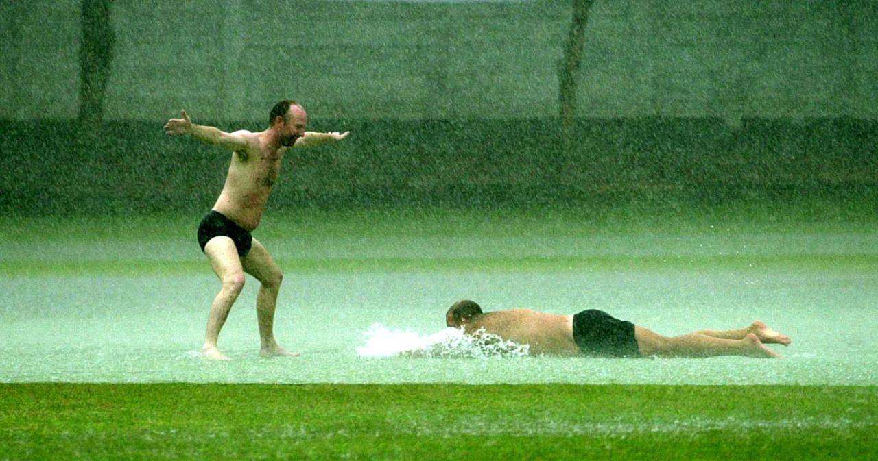 English spectators play in the rain, Board President's XI v England XI, Matara, 2nd day, February 16, 2001