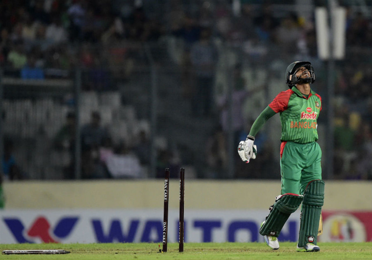 Mushfiqur Rahim reacts after he was bowled, Bangladesh v Pakistan, Only T20I, Dhaka, April 24, 2015 