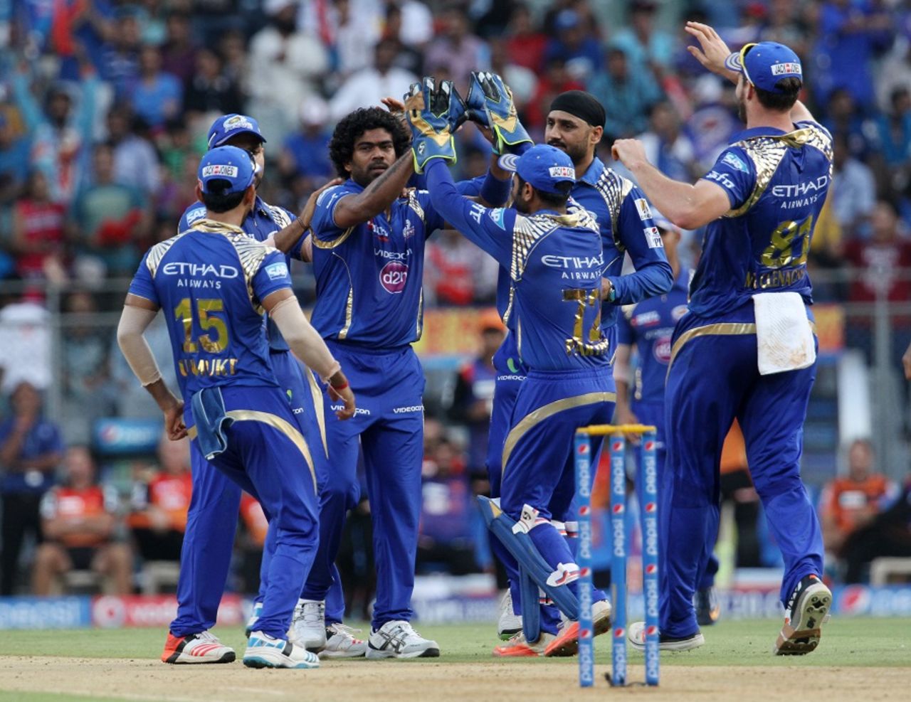 Lasith Malinga is mobbed by his team-mates, Mumbai Indians v Sunrisers Hyderabad, IPL 2015, Mumbai, April 25, 2015