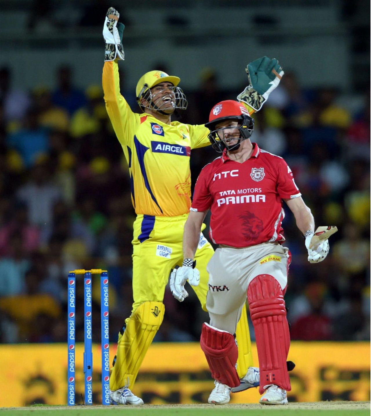 MS Dhoni exults after taking a catch to dismiss George Bailey, Chennai Super Kings v Kings XI Punjab, IPL 2015, Chennai, April 25, 2015