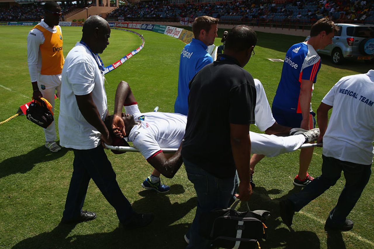 Jason Holder was stretched off the field with an ankle injury, West Indies v England, 2nd Test, St George's, 5th day, April 25, 2015