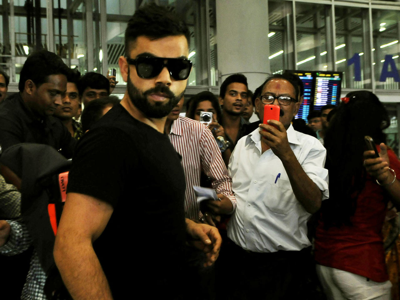 Virat Kohli arrives at the Kolkata airport, April 6, 2015