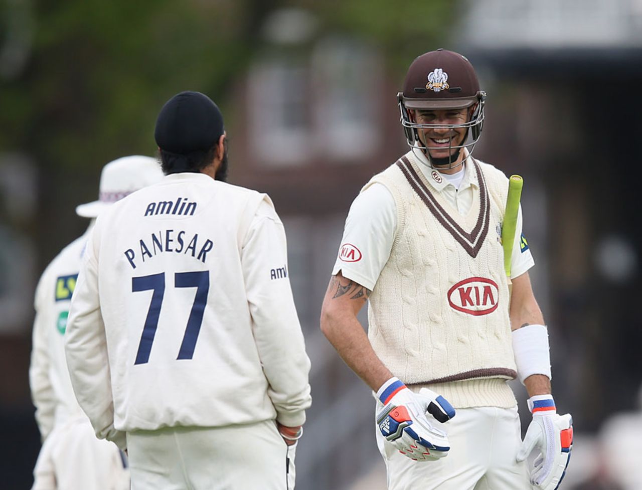 A way back for either? Kevin Pietersen shares a word with Monty Panesar, Surrey v Essex, County Championship Division Two, The Oval, 1st day, April 26, 2015