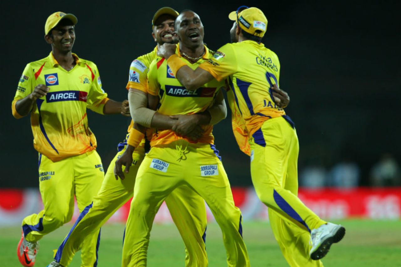 Dwayne Bravo is mobbed by his team-mates after taking a diving catch, Chennai Super Kings v Kolkata Knight Riders, IPL 2015, Chennai, April 28, 2015