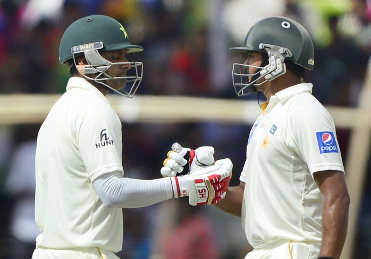 Mohammad Hafeez and Azhar Ali shake hands after fifty of their partnership, Bangladesh v Pakistan, 1st Test, Khulna, 2nd day, April 29, 2015