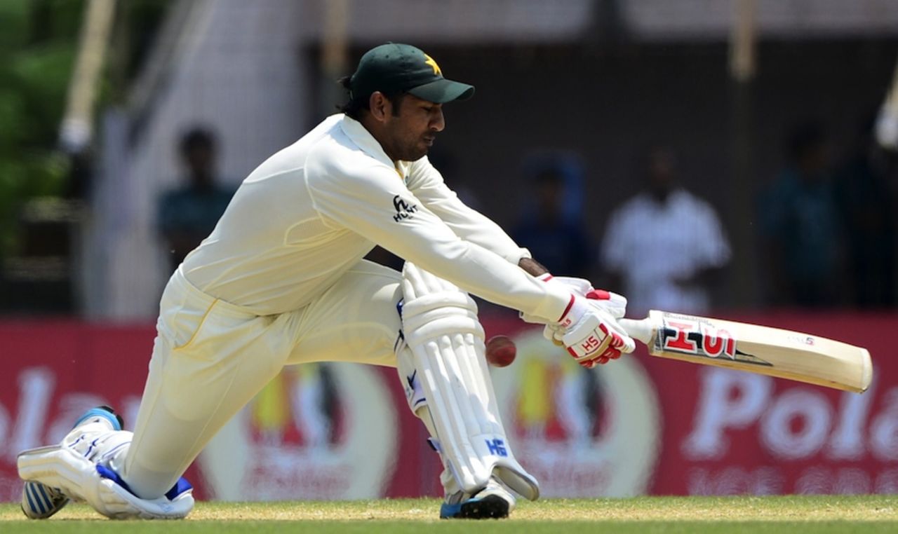 Sarfraz Ahmed sweeps during his innings of 82 off 88 balls, Bangladesh v Pakistan, 1st Test, Khulna, 4th day, May 1, 2015