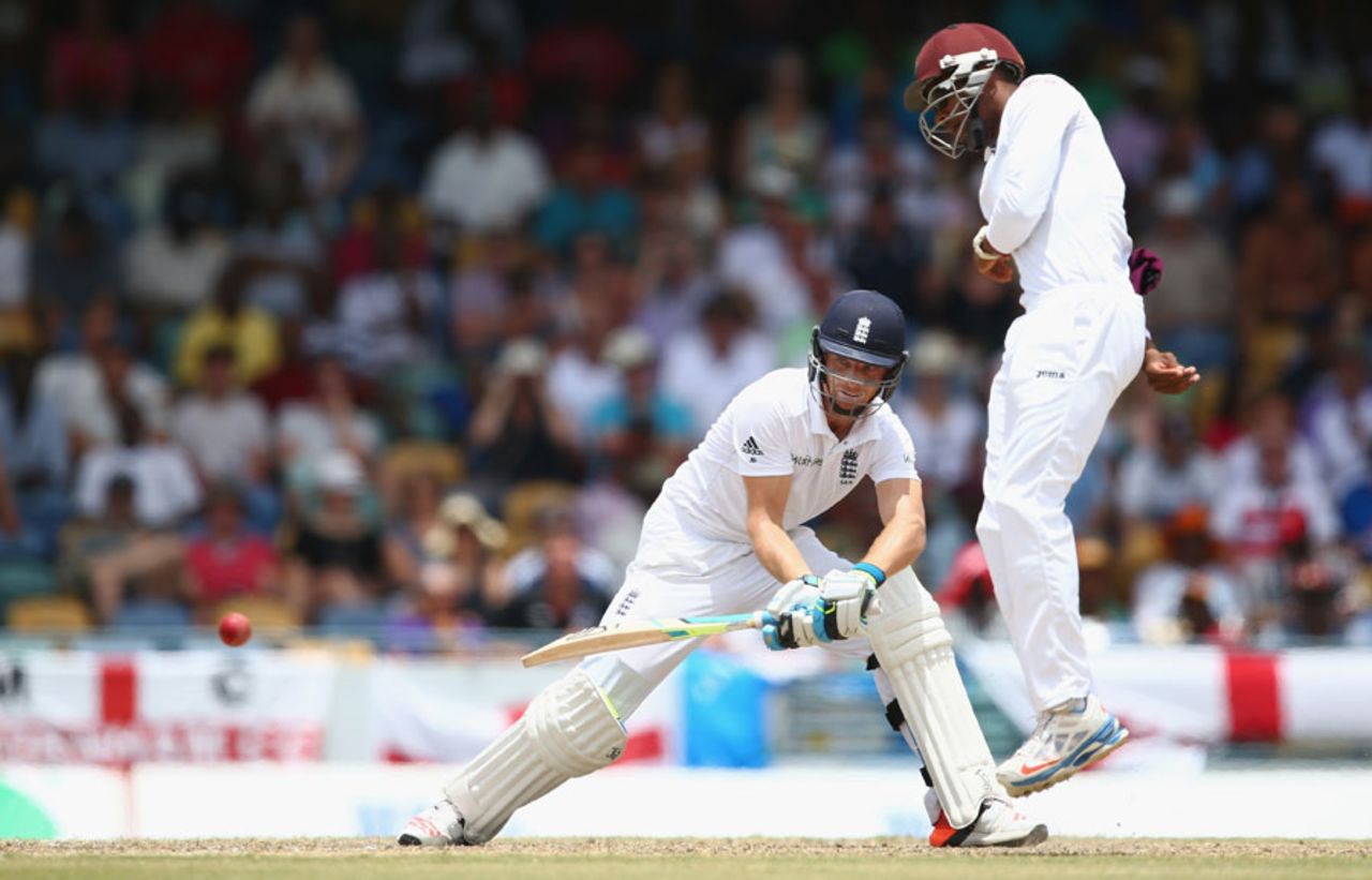 Jos Buttler plays a reverse sweep during his 35 off 42, West Indies v England, 3rd Test, Bridgetown, 3rd day, May 3, 2015