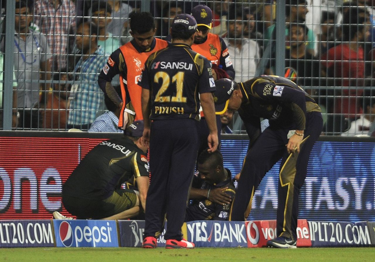 Andre Russell needed some attention after hurting his left shoulder,  Kolkata Knight Riders v Sunrisers Hyderabad, IPL 2015, Kolkata, May 4, 2015