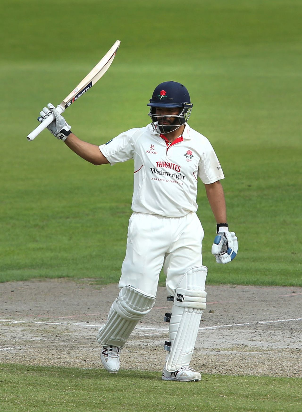 Ashwell Prince raises his bat for his fifty, Lancashire v Yorkshire, County Championship, Division One, Old Trafford, August 31, 2014