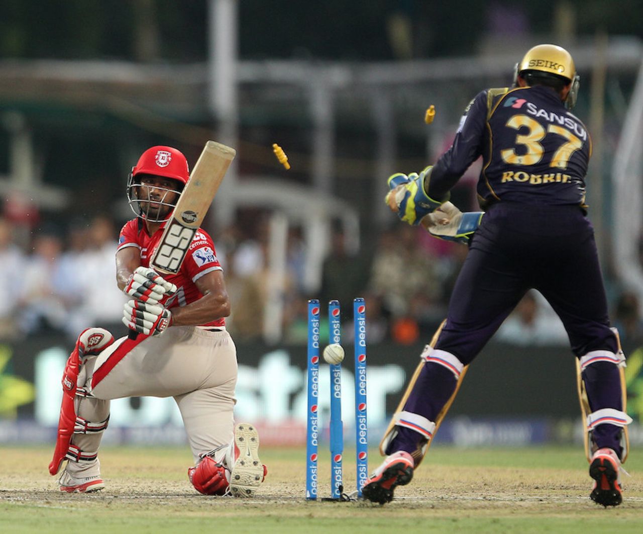 Wriddhiman Saha missed a sweep to be bowled by Sunil Narine, Kolkata Knight Riders v Kings XI Punjab, IPL 2015, Kolkata, May 9, 2015