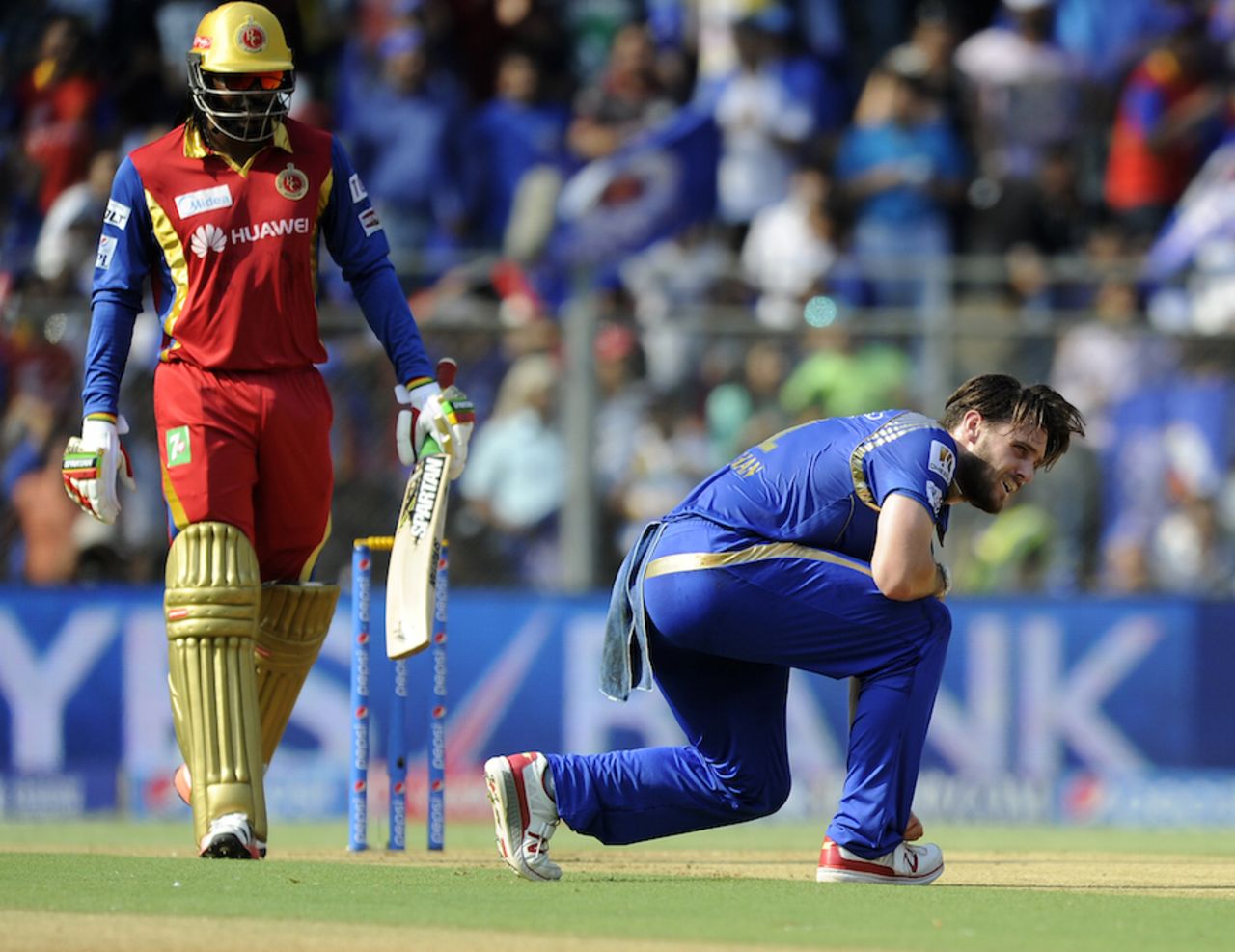 Mitchell McClenaghan was in despair after Rohit Sharma dropped Chris Gayle off his bowling, Mumbai Indians v Royal Challengers Bangalore, IPL 2015, Mumbai, May 10, 2015