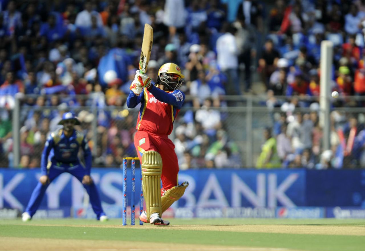 Chirs Gayle smashes through the off side, Mumbai Indians v Royal Challengers Bangalore, IPL 2015, Mumbai, May 10, 2015