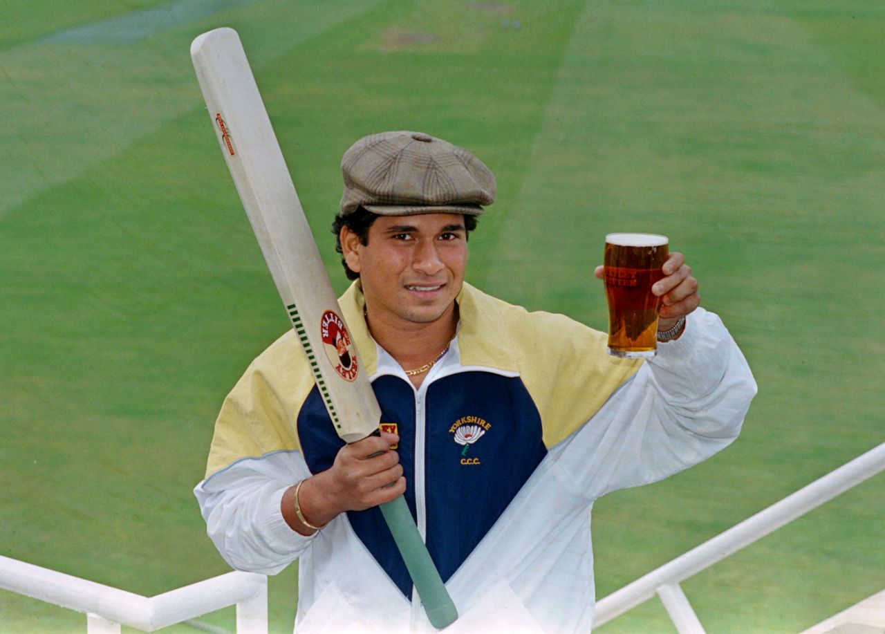 Sachin Tendulkar holds aloft a glass of beer at The Oval, ahead of his debut for Yorkshire, April 28, 1992