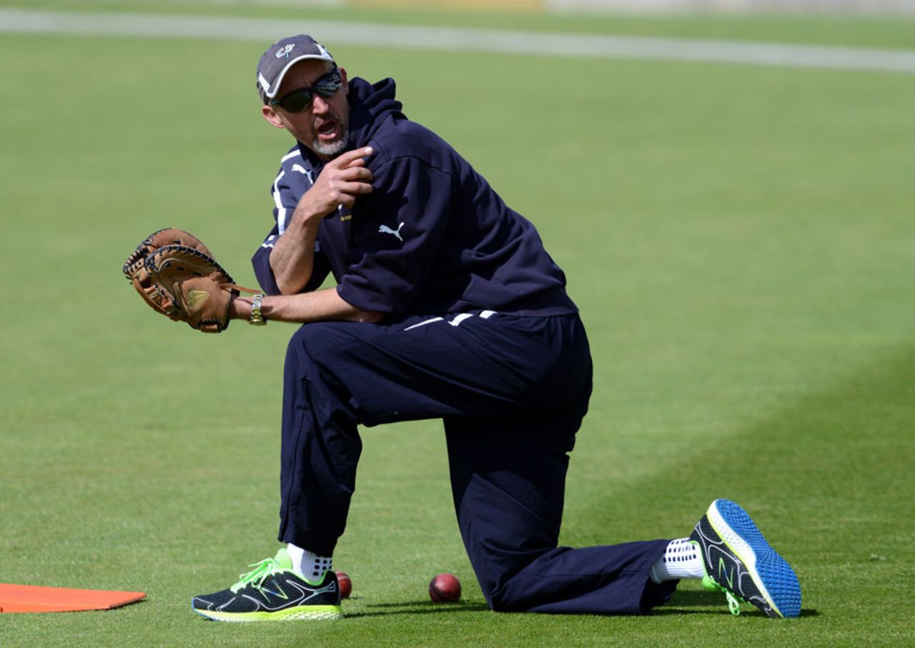 Jason Gillespie leads a drill before play, Yorkshire v Hampshire, County Championship, Division One, Headingley, 2nd day, May 11, 2015