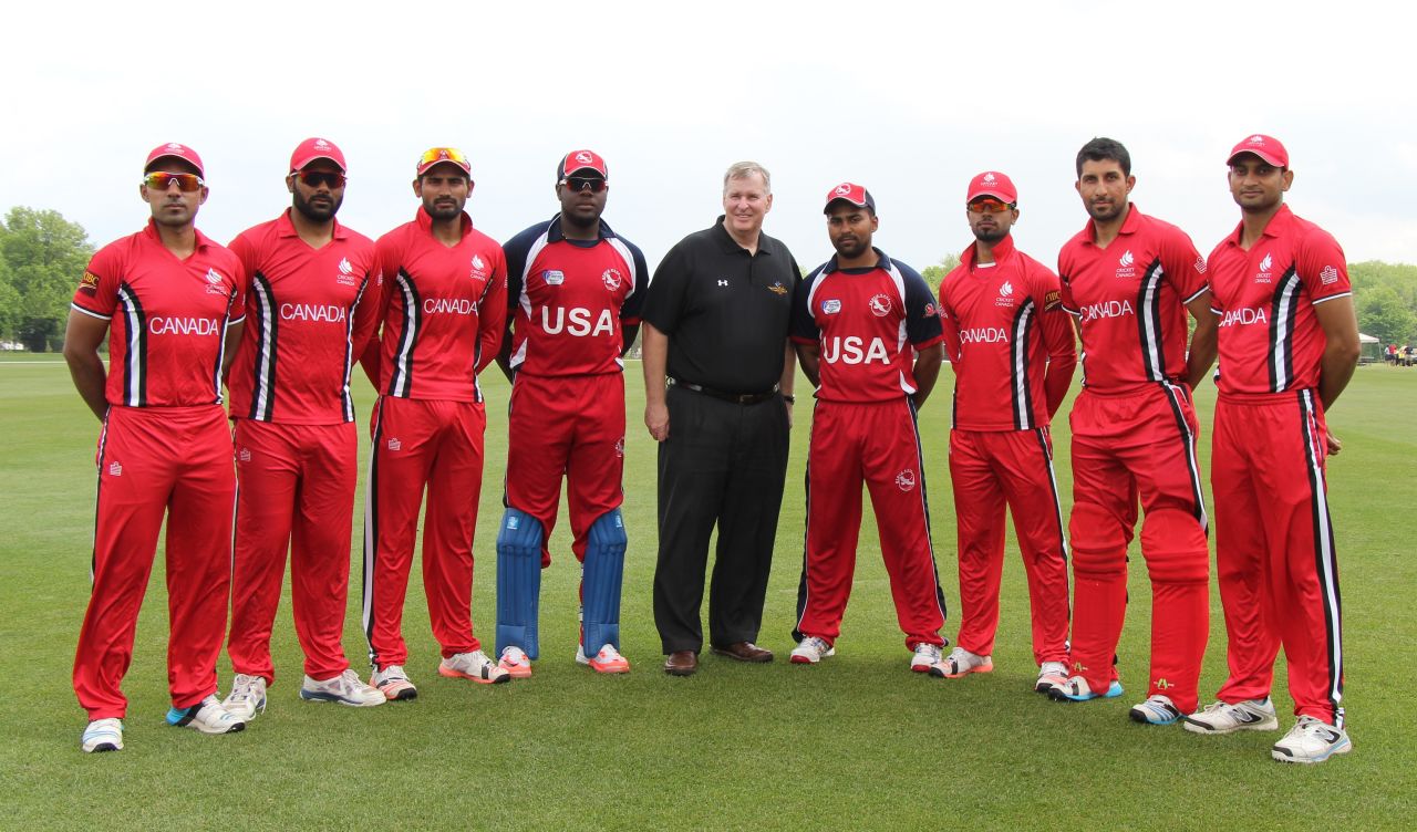 Indianapolis Mayor Greg Ballard poses with USA vice-captain Steven Taylor (l), captain Muhammad Ghous (r) and members of the Canada squad, Canada v United States of America, ICC Americas Regional T20, Indianapolis, May 9, 2015