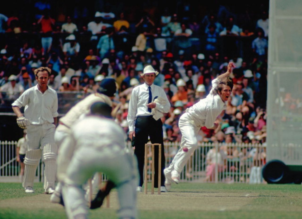 Jeff Thomson bowls to Alan Knott. Non-striker Derek Underwood at left. Australia v England, third Test, Melbourne, December 27, 1974