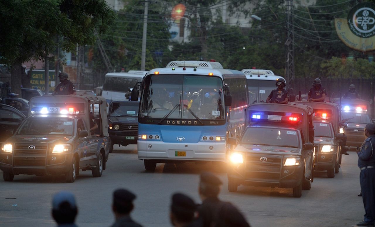 The teams get a security escort after the practice session, Lahore, May 19, 2015
