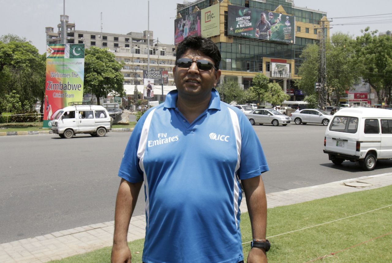 Umpire Ahsan Raza on his way to the stadium, Lahore, May 20, 2015