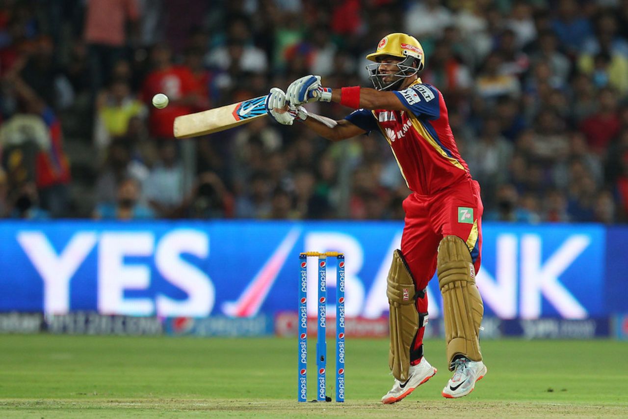 Mandeep Singh goes on his toes for an upper cut, Rajasthan Royals v Royal Challengers Bangalore, IPL 2015, Eliminator, Pune, May 20, 2015