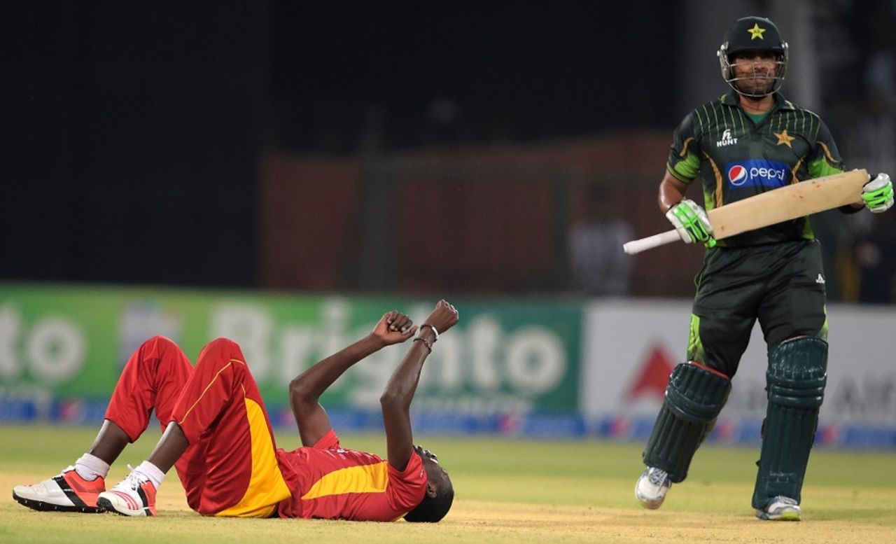 Floored him: Chris Mpofu celebrates removing Umar Akmal, Pakistan v Zimbabwe, 2nd T20I, Lahore, May 24, 2015