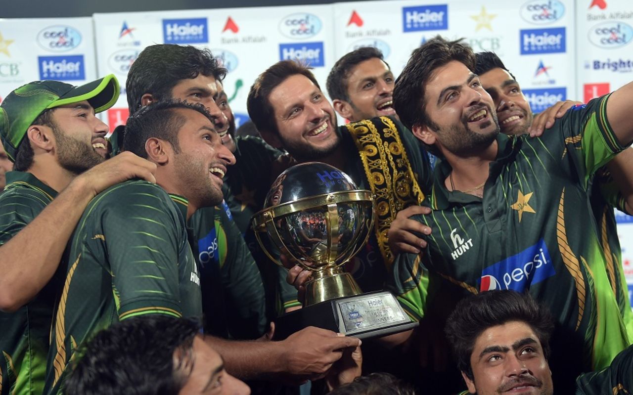 The Pakistan players celebrate after taking the series 2-0, Pakistan v Zimbabwe, 2nd T20I, Lahore, May 24, 2015