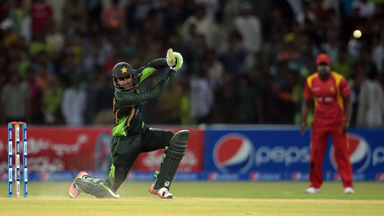 Shoaib Malik laces a drive through the covers, Pakistan v Zimbabwe, 1st ODI, Lahore, May 26, 2015