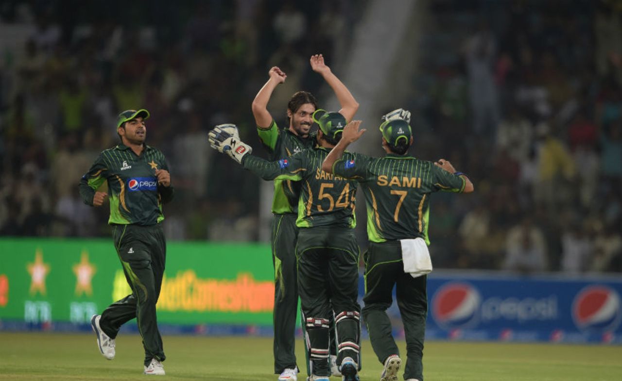 Anwar Ali celebrates a wicket with his team-mates, Pakistan v Zimbabwe, 1st ODI, Lahore, May 26, 2015