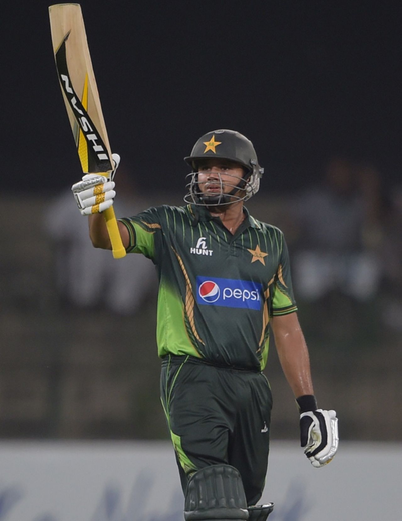 Azhar Ali celebrates after completing his half-century, Pakistan v Zimbabwe, 2nd ODI, Lahore, May 29, 2015