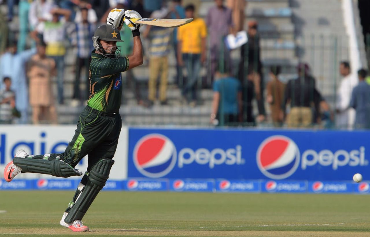 Azhar Ali strikes a pose after hitting through the covers, Pakistan v Zimbabwe, 3rd ODI, Lahore, May 31, 2015