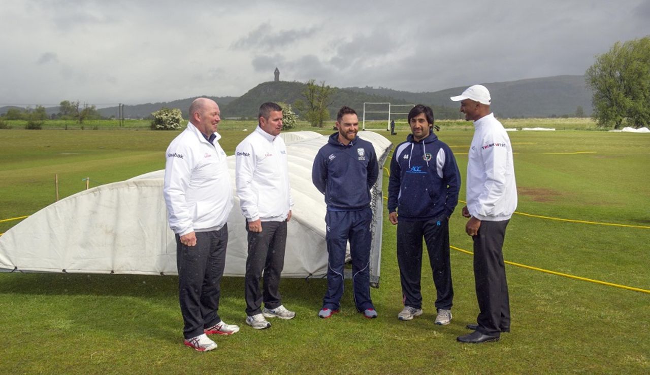 Preston Mommsen and Asghar Stanikzai have a chat with the umpires, ICC Intercontinental Cup, Scotland v Afghanistan, Stirling, June 2, 2015