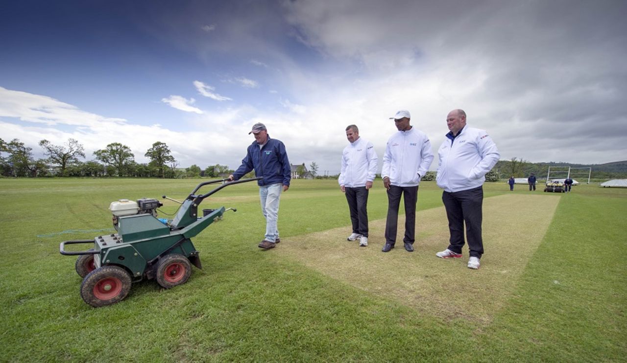 Umpires Allan Haggo and Gregory Brathwaite check in with the groundsmen, ICC Intercontinental Cup, Scotland v Afghanistan, Stirling, 1st day, June 2, 2015