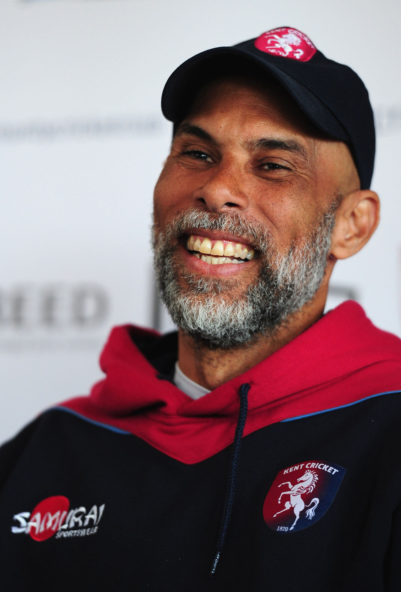 Jimmy Adams, head coach of Kent, speaks to the media, April 10, 2015