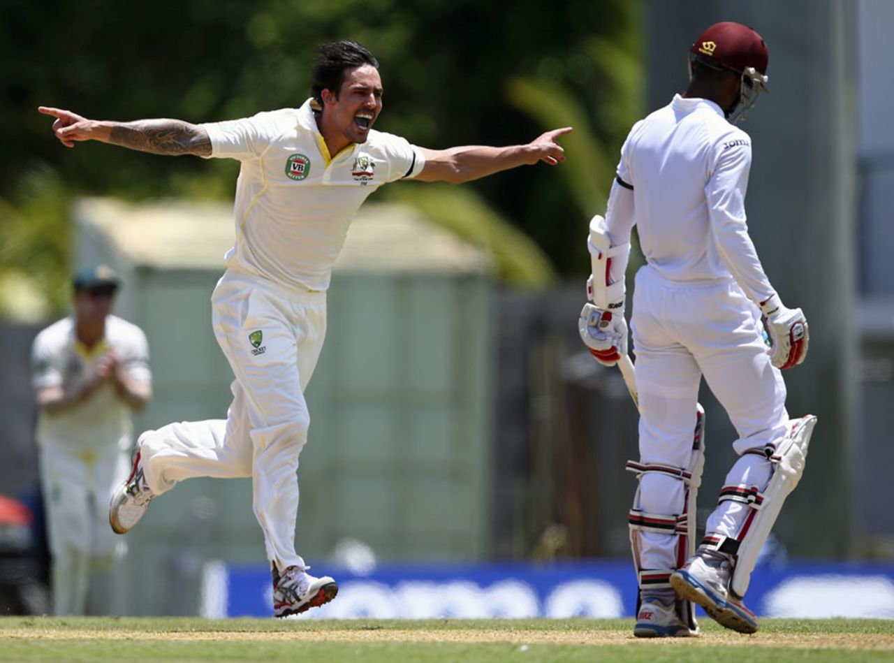 Mitchell Johnson exults after getting Shai Hope out, West Indies v Australia, 1st Test, 1st day, Roseau, June 3, 2015