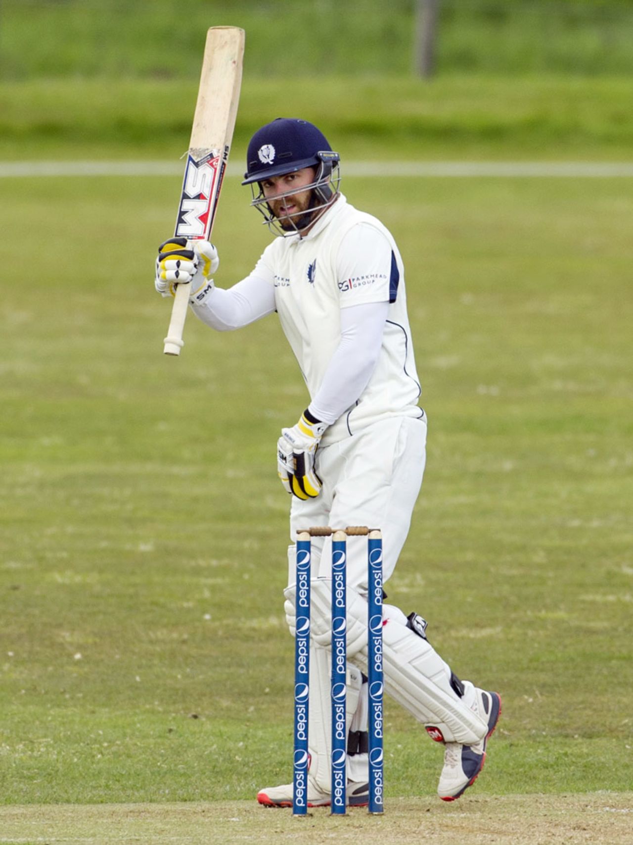 Scotland captain Preston Mommsen raises his bat after reaching 50, Scotland v Afghanistan, ICC Intercontinental Cup, 2nd day, Stirling, June 3, 2015