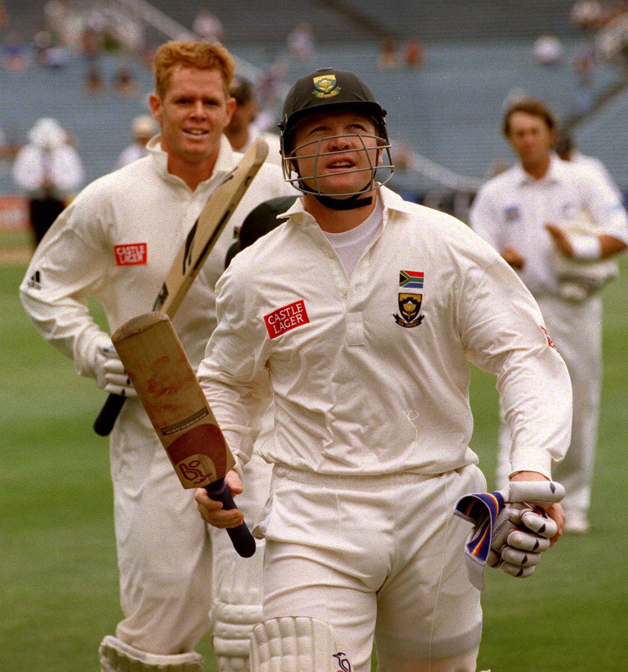 Daryll Cullinan and Shaun Pollock leave the field, after Cullinan scored a South Africa-record 275 runs, New Zealand v South Africa, day three, Auckland