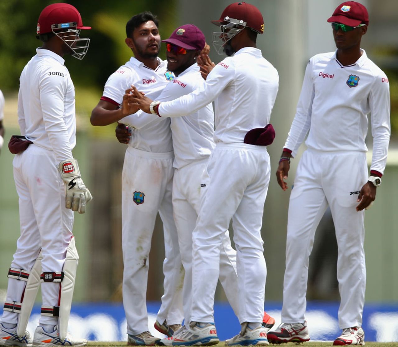 Devendra Bishoo is congratulated after dismissing Brad Haddin, West Indies v Australia, 1st Test, Roseau, 2nd day, June 4, 2015