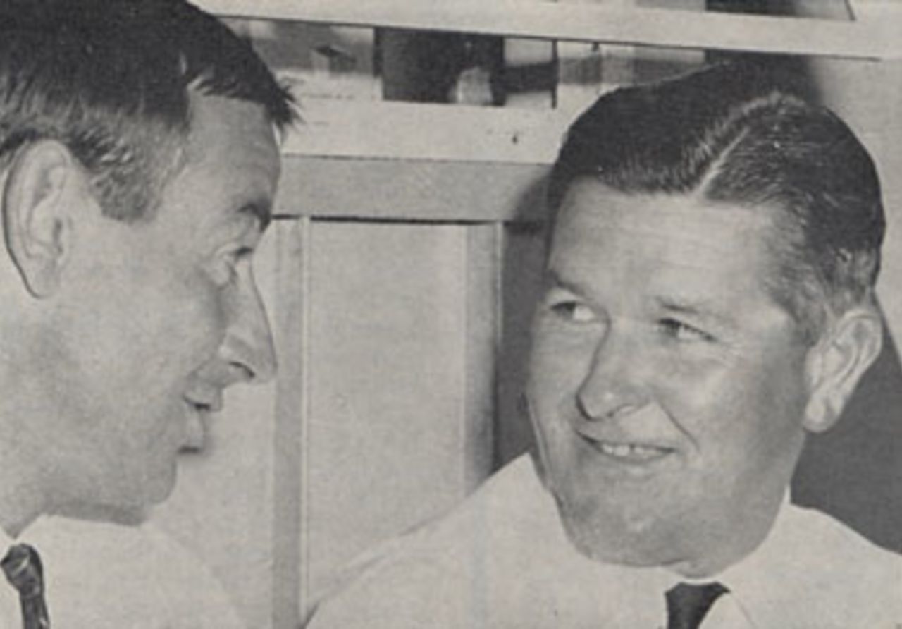 Ian Meckiff (left) confers with umpire Colin Egar in the pavilion at Brisbane.  Egar had no-balled him four times for throwing in his first - and only - over