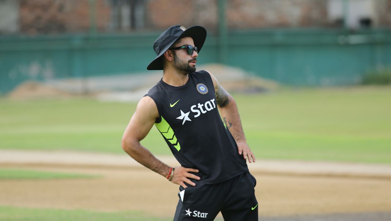 Match my moves: Virat Kohli stretches during a practice session, Mirpur, June 8, 2015
