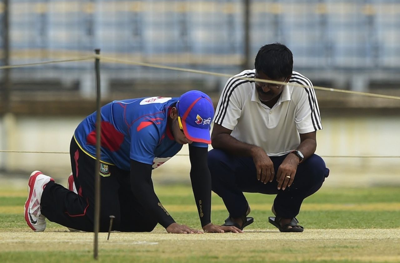 Mushfiqur Rahim takes a look at the pitch on the eve of the Test against India, Fatullah, June 9, 2015