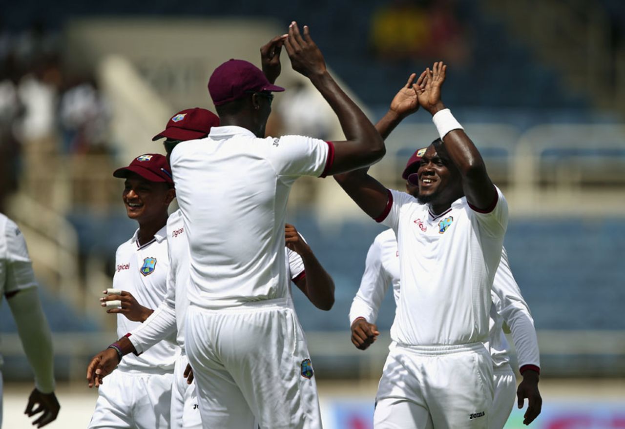 Jerome Taylor celebrates after dismissing David Warner, West Indies v Australia, 2nd Test, 1st day, Kingston, June 11, 2015