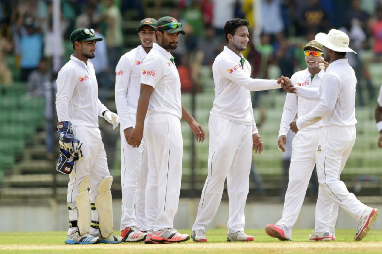 Shakib Al Hasan celebrates a wicket with his team-mates, Bangladesh v India, only Test, 3rd day, Fatullah, June 12, 2015