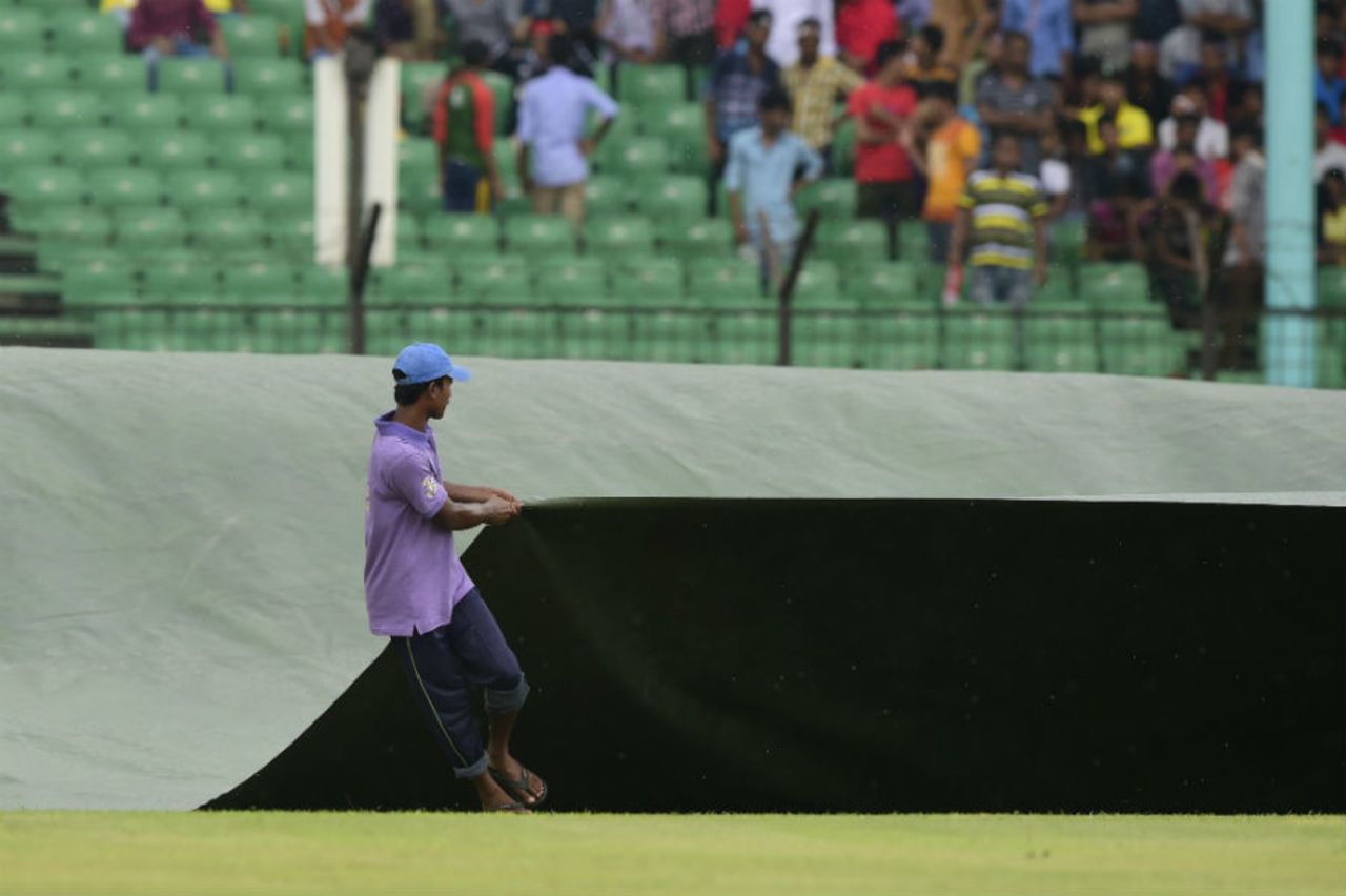 Rain kept making brief appearances at the Khan Shaheb Osman Ali Stadium, Bangladesh v India, only Test, 3rd day, Fatullah, June 12, 2015