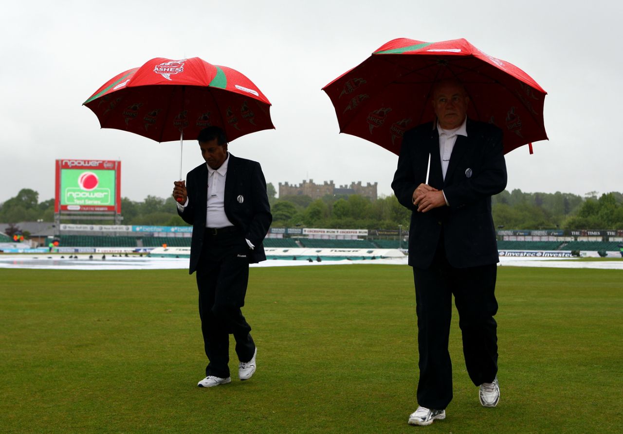 Umpires Asoka de Silva and Steve Davis walk off, England v West Indies, 2nd Test, Chester-le-Street, 2nd day, May 15, 2009