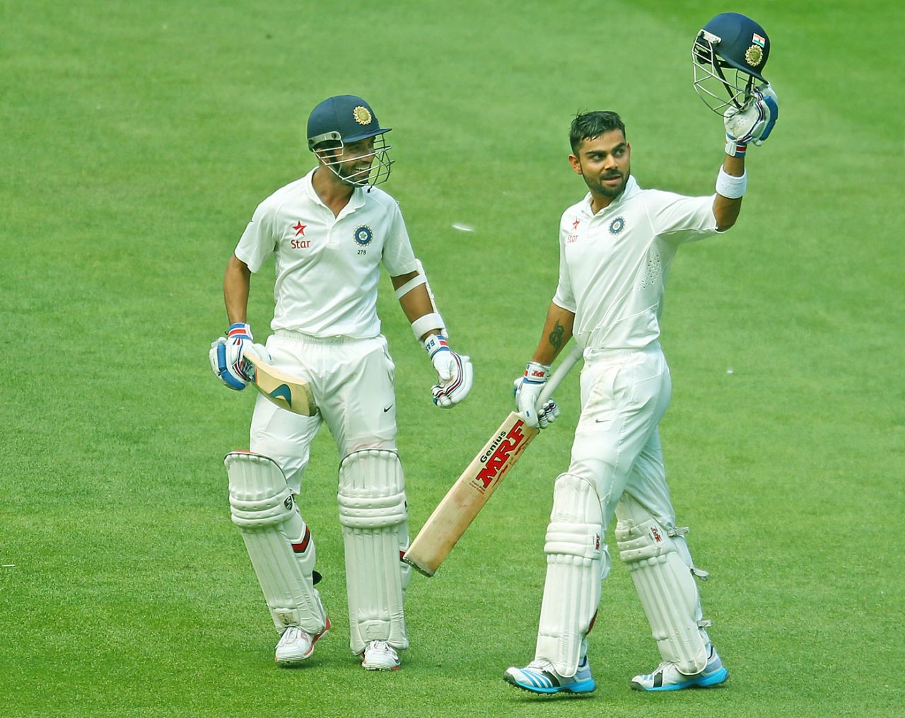 Virat Kohli is joined by Ajinkya Rahane as he celebrates his century, Australia v India, 3rd Test, Melbourne, 3rd day, December 28, 2014