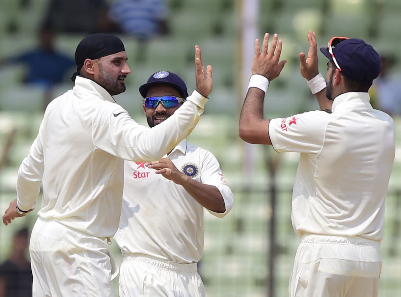 Harbhajan Singh crossed Wasim Akram's tally of 414 Test wickets when he had Imrul Kayes stumped, Bangladesh v India, only Test, 4th day, Fatullah, June 13, 2015