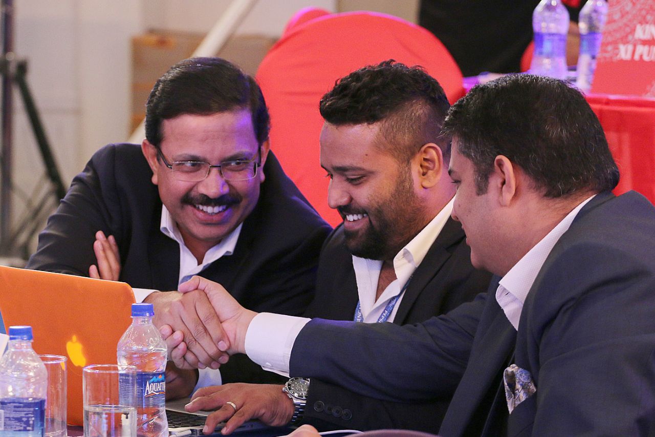 KKR CEO Venky Mysore (far left) and AR Srikkanth (middle) at the IPL auction, Bangalore, February 16, 2015