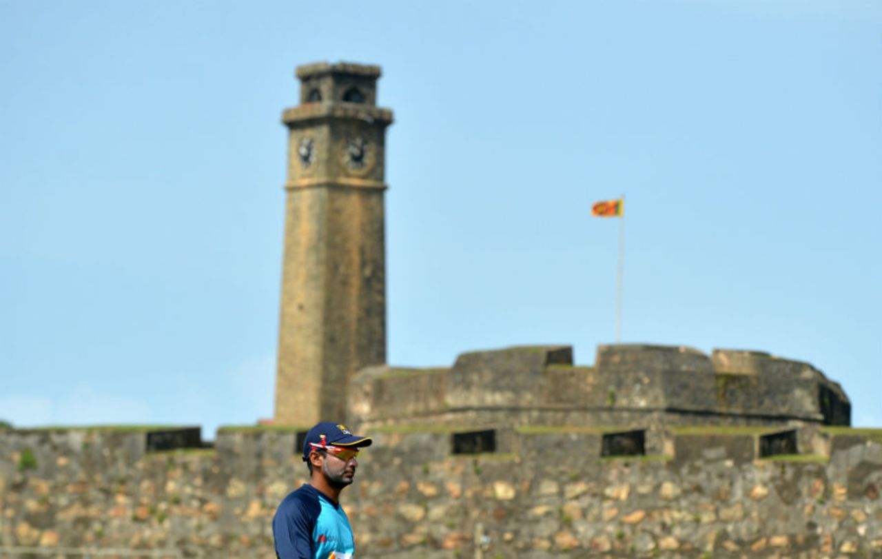 Kumar Sangakkara trains under the watchful eyes of the Galle Fort clock tower, Galle, June 16, 2015